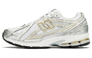 أصلي 100% حذاء New Balance 1906R باللون الأبيض والذهبي - رفعة
