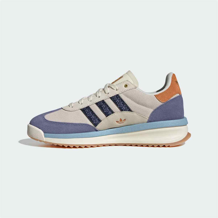 Adidas Clover casual sneakers in blue and beige with modern design and durable materials.