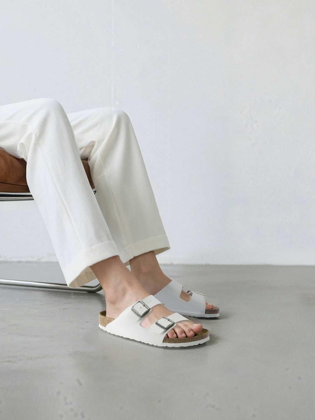 BIRKENSTOCK  Arizona double-buckle slippers.