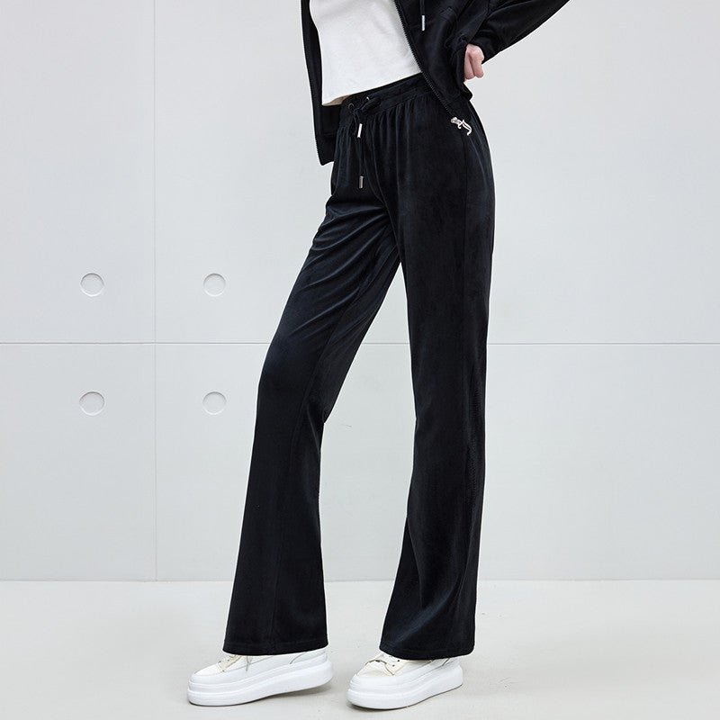 بنطال مخمل نسائي Juicy Couture واسع الأسفل بأحجار لامعة - رفعة