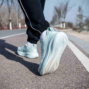 حذاء جري ASICS Gel-Nimbus 27 مريح بلون Pure Aqua.