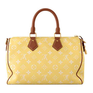 حقيبة Louis Vuitton Speedy 30 باللون الأصفر المميز.