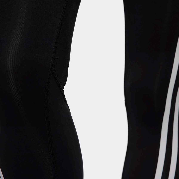 adidas women's classic striped sports leggings in black fabric with white stripes, perfect for spring and autumn fitness.