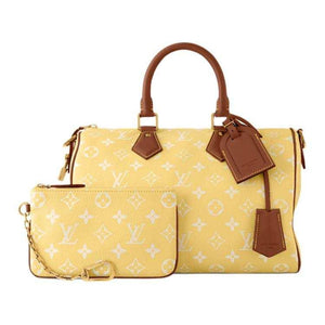 حقيبة Louis Vuitton Speedy 30 باللون الأصفر المميز.