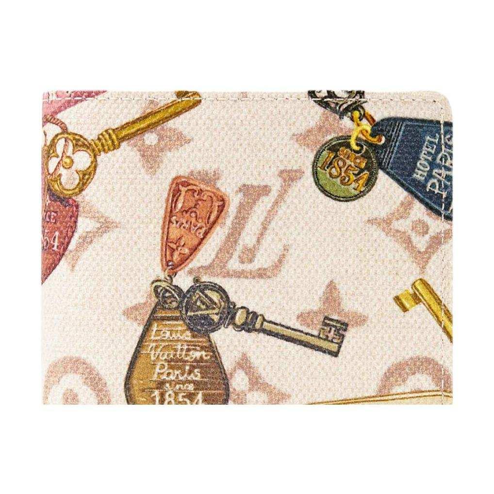 غلاف جواز سفر Monogram بنقشة مفاتيح Louis Vuitton.