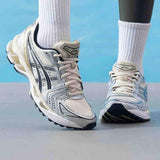 حذاء رياضي ASICS GEL-KAYANO 14 بلون فضي Birch Pure Silver.