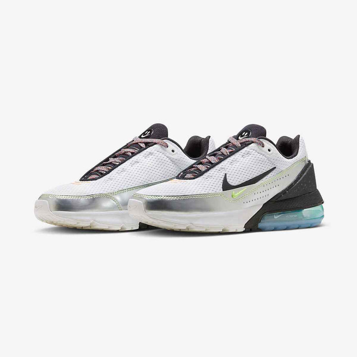 Nike Air Max 270 sneakers in white, black, and light blue with large air cushion and modern design.