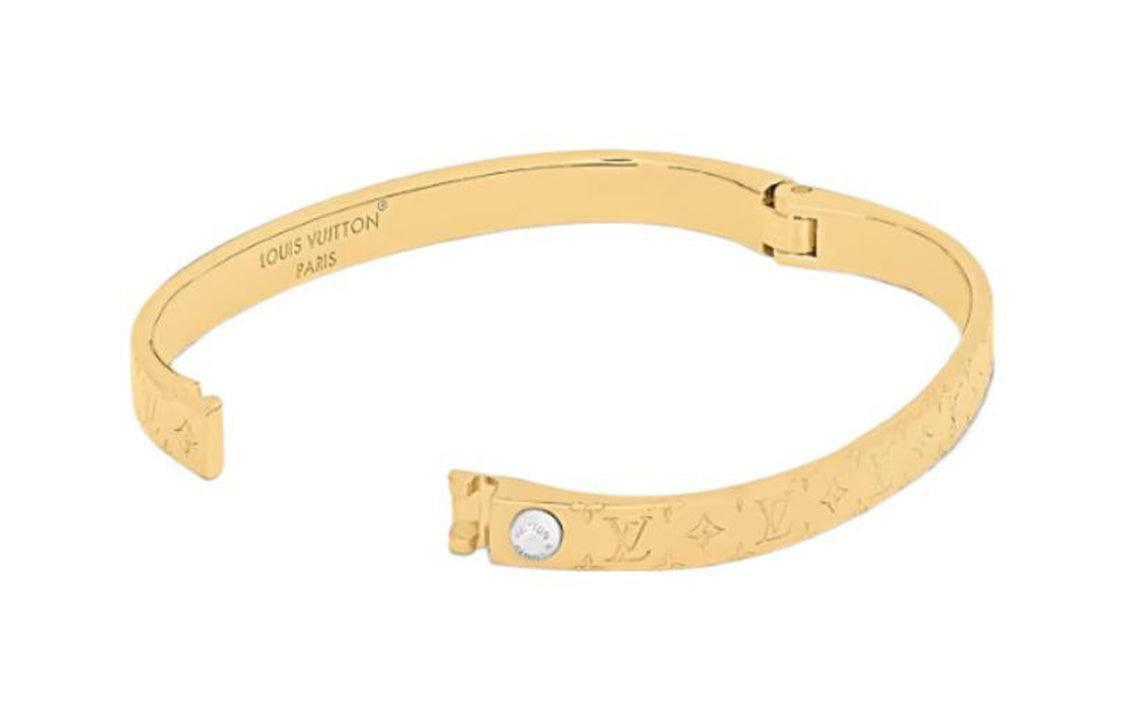 LOUIS VUITTON Logo engraved metal bracelet women's gold.