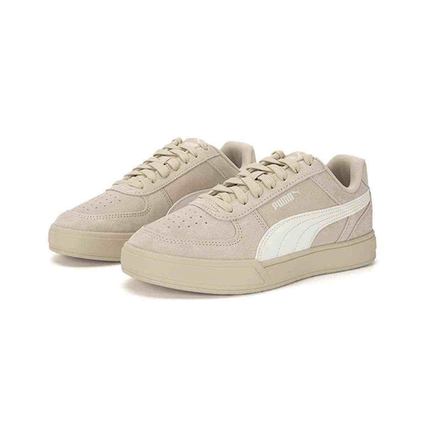 Beige Puma unisex suede sneakers with white side stripe and rubber sole