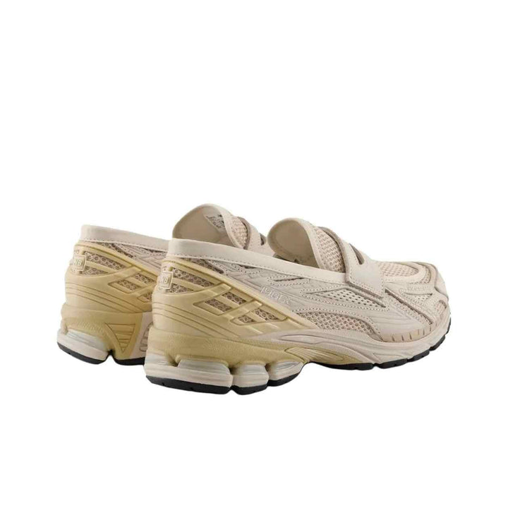 New Balance 1906 beige lightweight mesh and leather sneakers with rubber sole and lace-up closure