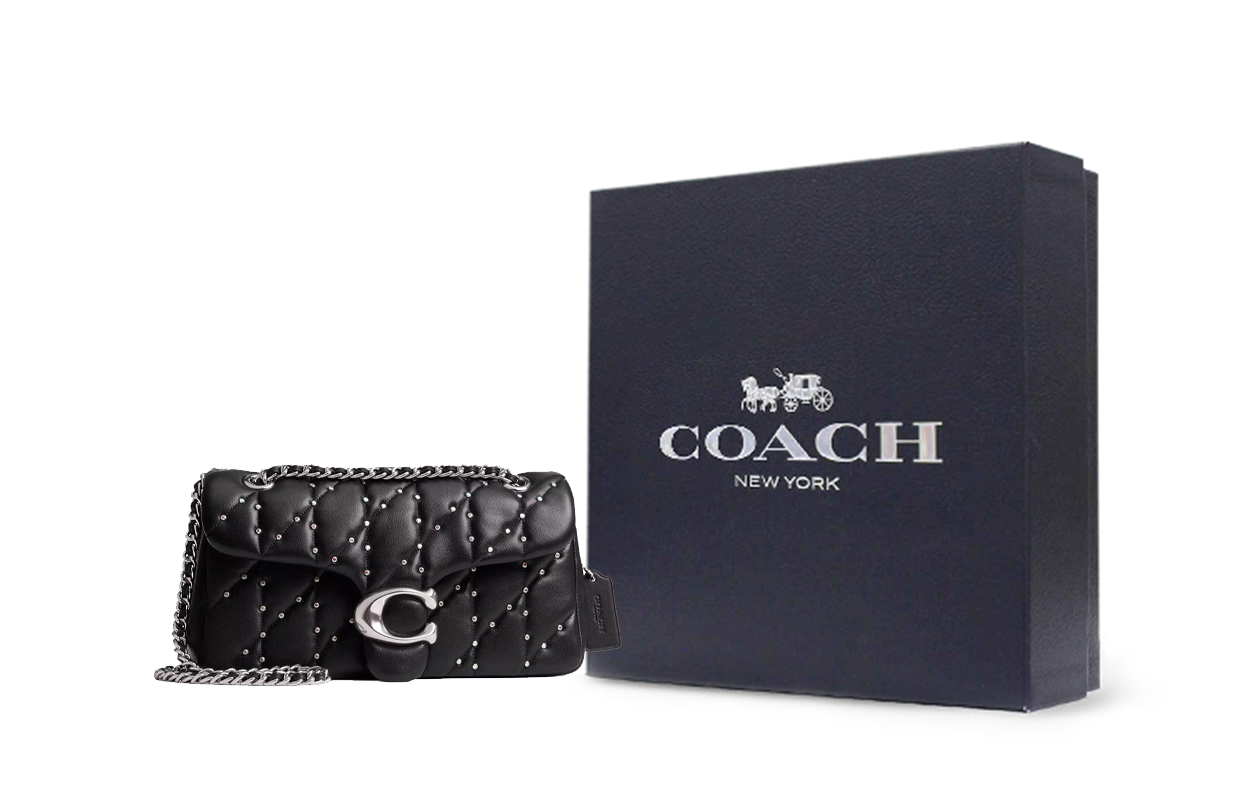حقيبة كتف COACH جلد أسود مبطنة ومرصعة.