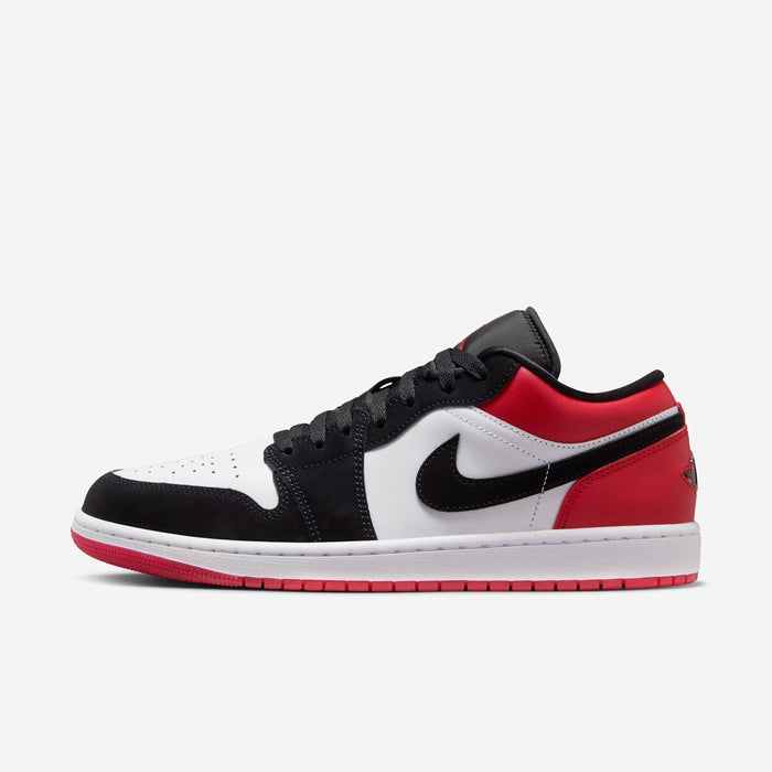 Air Jordan 1 Low men's shoe in white, varsity red, black, iconic 1985-inspired design.