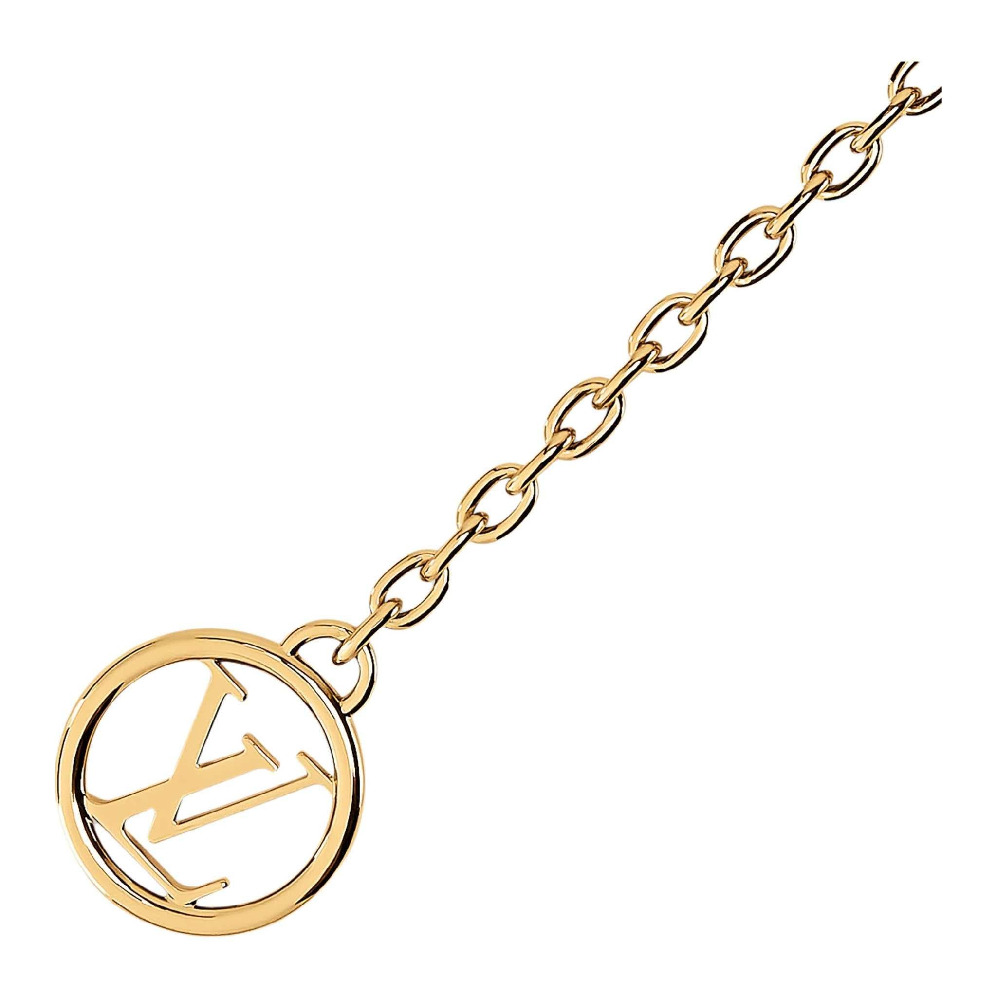 حقيبة Louis Vuitton Denim Monogram بحزام Chain ذهبي.