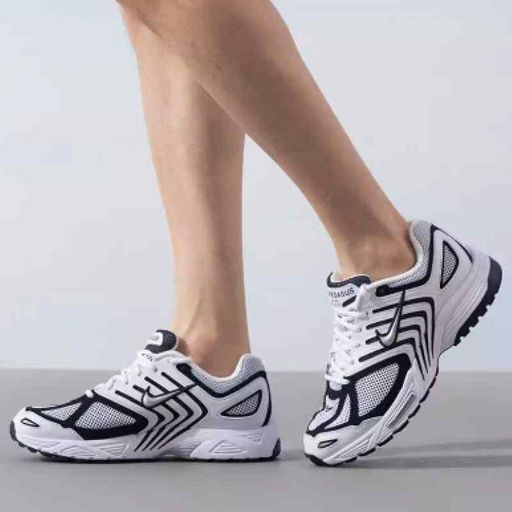 Nike Pegasus 2K5 white and black sneakers with classic style and modern performance.