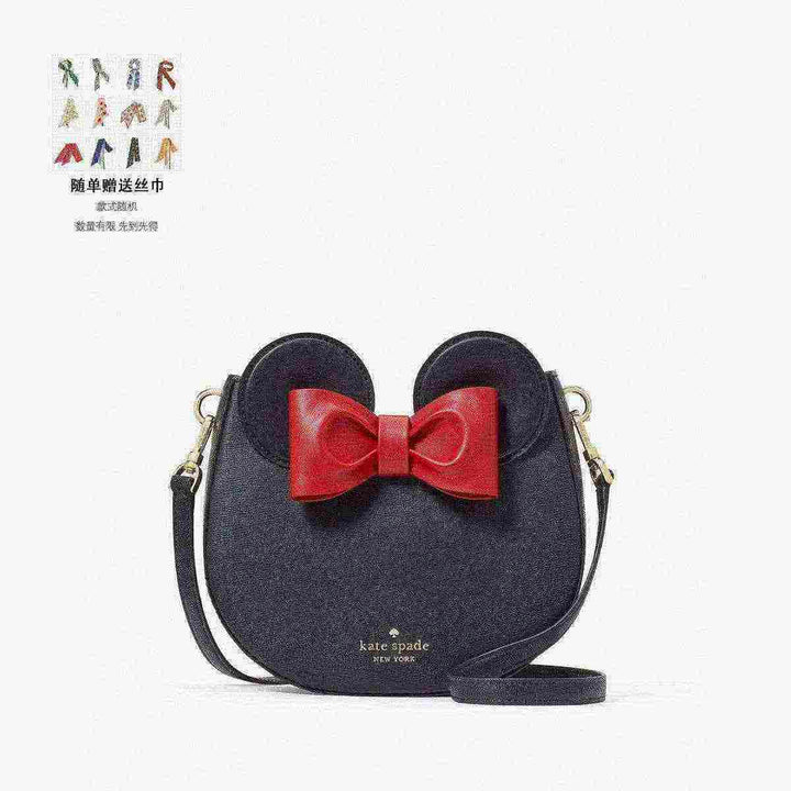 Kate Spade Minnie Mouse-inspired bag with red bow and ears design.