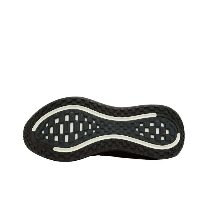 Nike Vomero Plus shoe outsole with black and white non-slip tread pattern for enhanced grip