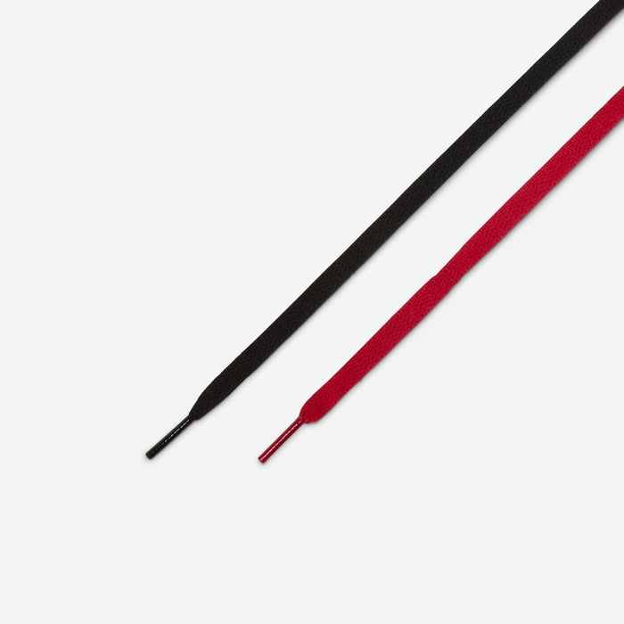 Black and red shoelaces for Air Jordan 1 Low sneakers.
