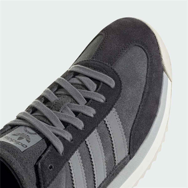 Adidas Clover classic design shoe with BOOST technology and suede accents.