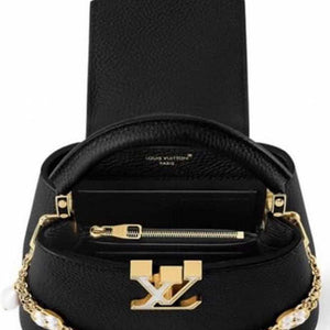 LOUIS VUITTON Capucines Gold Black.