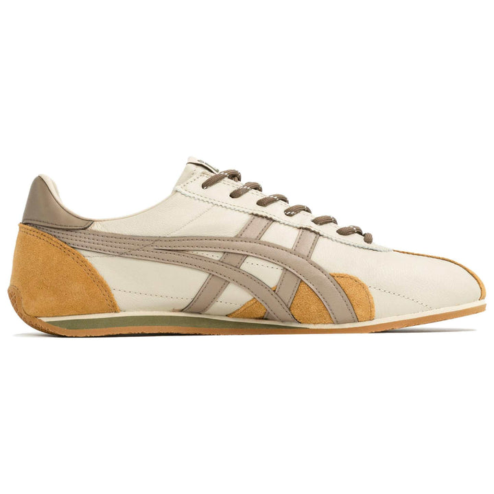 حذاء أونيتسوكا تايغر تصميم خاص بلون كريمي مع لمسات برتقالية وصفراء من جلد سويدي ونعل مطاطي مرن مناسب للارتداء اليومي والأناقة العصرية