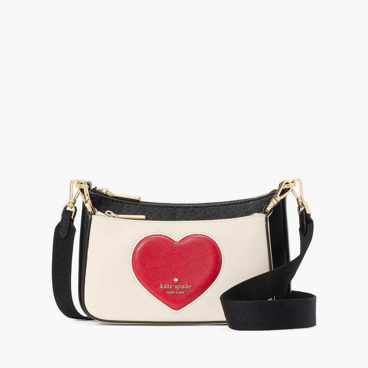 Kate Spade Duet Crossbody with red heart detail and adjustable strap.