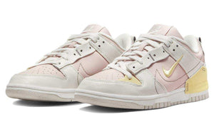 حذاء Nike Dunk Low Disrupt 2 وردي وأصفر.