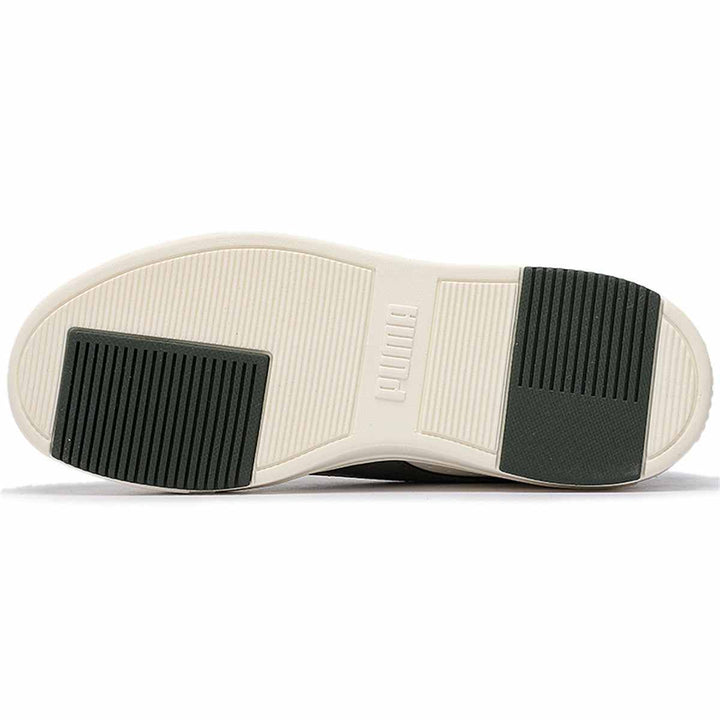 Puma sneakers bottom view with ivory and olive green sole design.