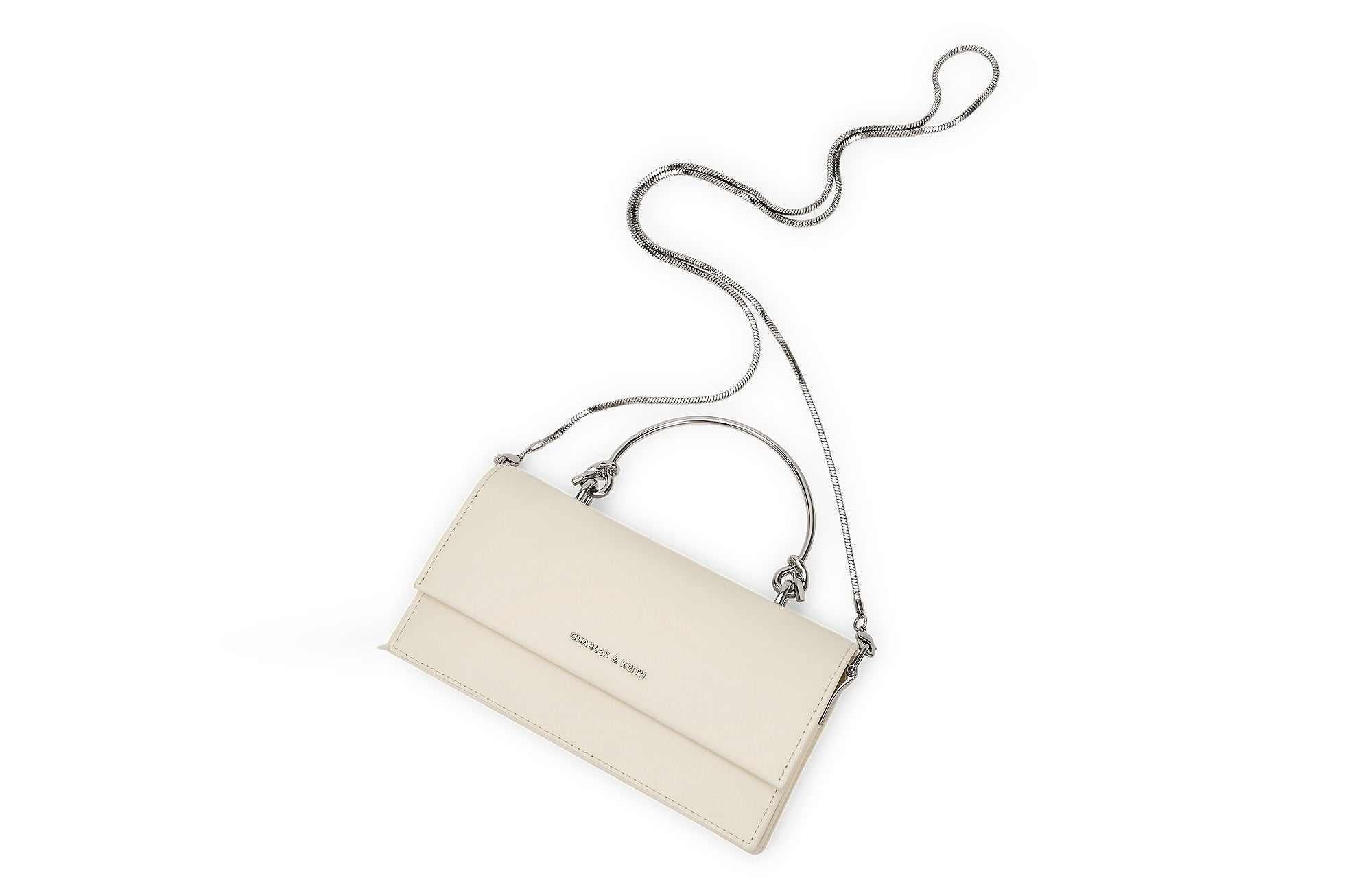 حقيبة Charles & Keith بمقبض علوي معدني وتصميم Crossbody.