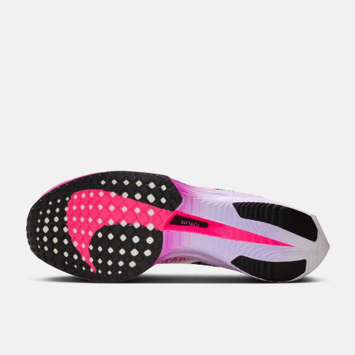 Bottom view of Nike Vaporfly shoe showcasing black and pink sole design for optimal speed and grip.