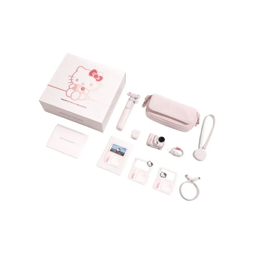 Complete box contents and accessories of the limited edition Hello Kitty Insta360 GO Ultra including the pink action pod, carrying case, mini selfie stick, and magnetic pendant.