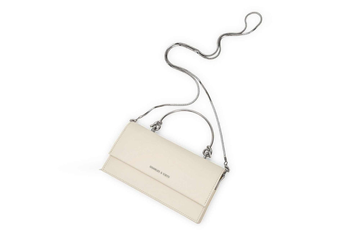 حقيبة Charles & Keith بمقبض علوي معدني وتصميم Crossbody.