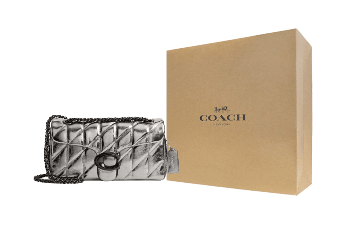 حقيبة كتف Coach مبطنة لون فضي.