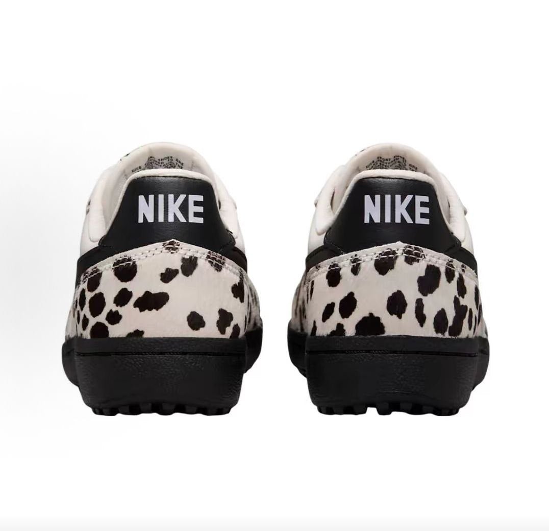 حذاء Nike رياضي مميز بنقشة البقر أبيض وأسود - رفعة