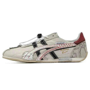 حذاء رياضي Onitsuka Tiger PandaPrank بتصميم عصري أبيض وأسود.