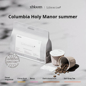 علبة كبسولات xBloom كولومبيا Holy Manor بإيحاءات زهرية من الأمام