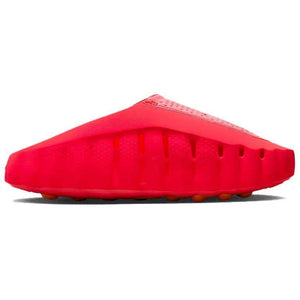 Studio profile shot of the Nike Mind 001 neon red slide, highlighting its sleek structured silhouette and lower ventilation slits.