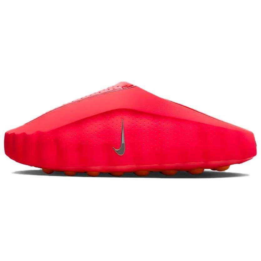 Side profile of the Nike Mind 001 slip-on shoe in vibrant neon red, showcasing the clean architectural design and metallic silver swoosh.