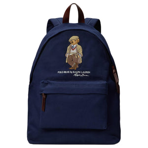 Full front view of an authentic Ralph Lauren Polo Bear navy blue backpack with brown leather handle and zipper straps, perfect for back-to-school season.

عرض أمامي كامل لحقيبة ظهر Ralph Lauren Polo Bear كحلي أصلية مع مقبض وأشرطة سحاب من الجلد البني، مثالية لموسم العودة للمدرسة.