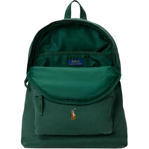 Open interior view of an original Ralph Lauren green school backpack showing main storage compartment and blue interior brand label.

عرض داخلي مفتوح لحقيبة ظهر مدرسة رالف لورين أصلية باللون الأخضر يوضح مساحة التخزين الرئيسية وعلامة الماركة الزرقاء الداخلية.