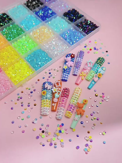 Colorful Nail Art Rhinestones Display
Colorful flatback rhinestones for nail art designs with glue and tools - أحجار الراين وفصوص كريستالية للأظافر