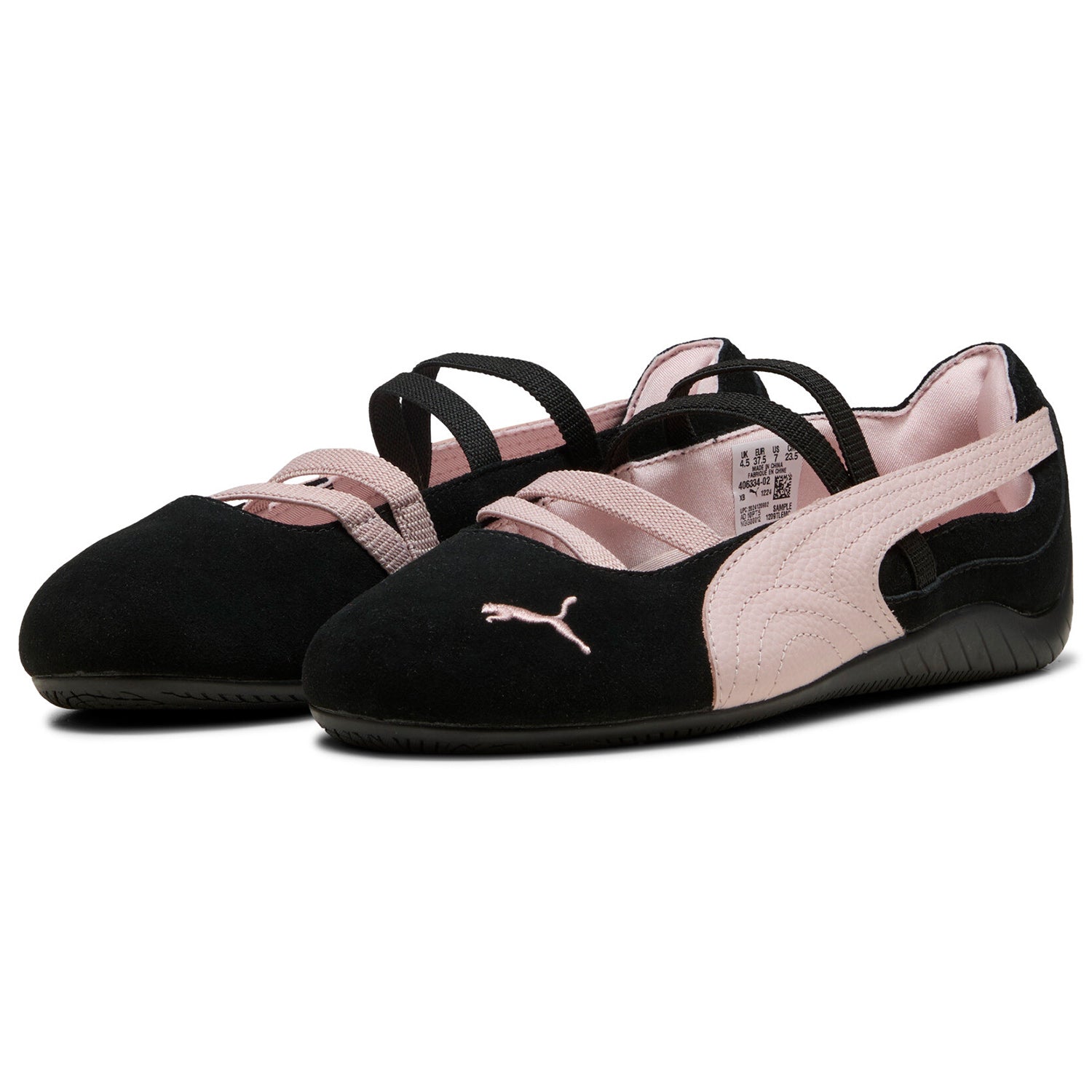 Pair of original Puma Speedcat Ballet black pink shoes front angle view on white background.