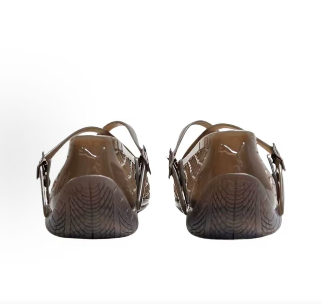 Puma Speedcat Ballet Strap brown jelly shoes back view displaying translucent heel design.