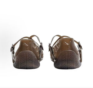Puma Speedcat Ballet Strap brown jelly shoes back view displaying translucent heel design.