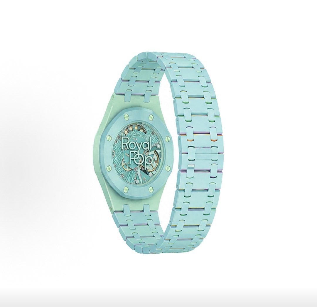 Angled back view of the light blue and green Royal Pop watch, highlighting the inner mechanism and the continuity of the strap design.