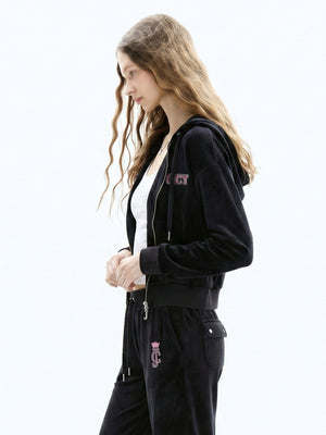 سترة مخمل مرن نسائية Juicy Couture بأحجار لامعة سوداء - رفعة