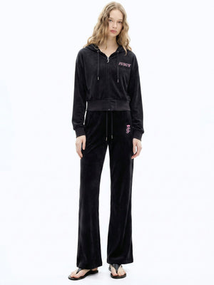 سترة مخمل مرن نسائية Juicy Couture بأحجار لامعة سوداء - رفعة
