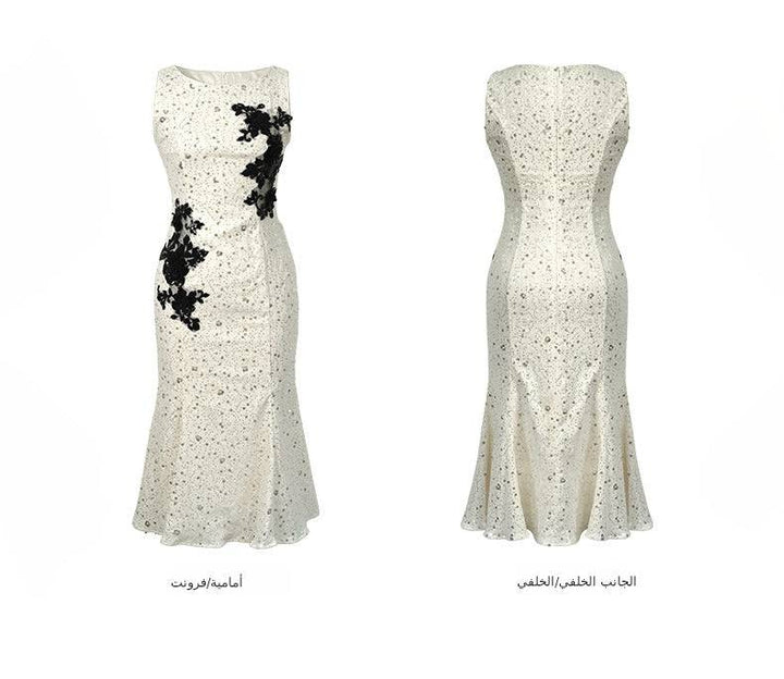 Elegant lace dress with sequin embroidery and floral 3D details in mermaid style.