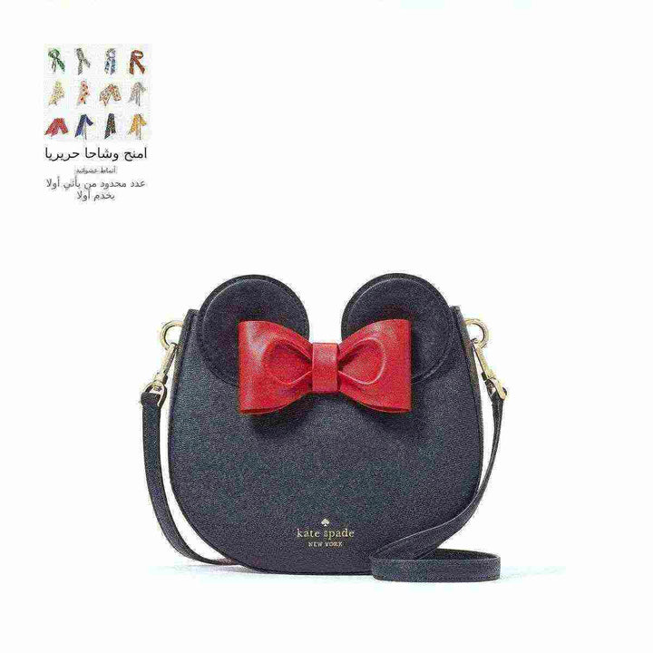 Kate Spade Minnie Mouse inspired bag with red bow and adjustable strap.