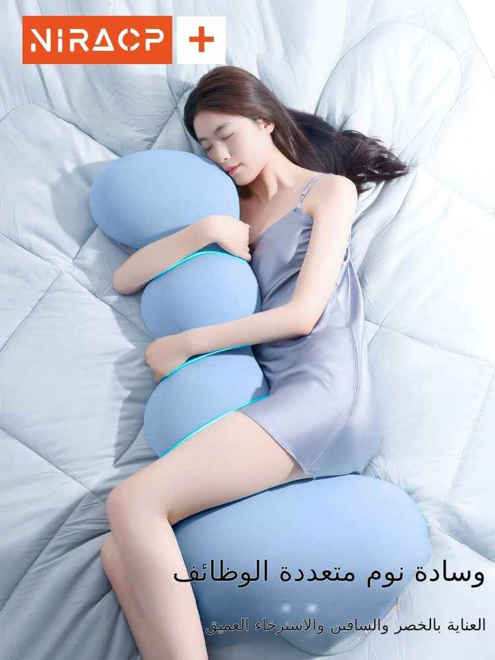 Ergonomic body pillow for side sleeping on the bed, ideal for pregnant women and adults.