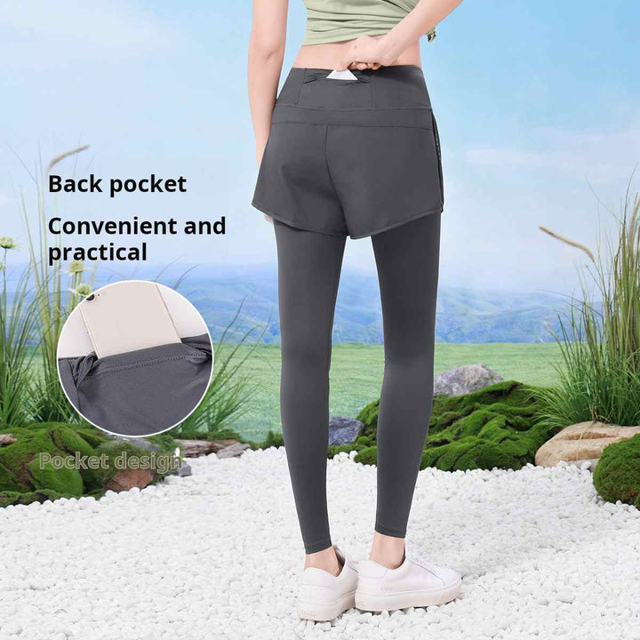 Women's athletic leggings with shorts, featuring a back pocket, ideal for comfort and style.
